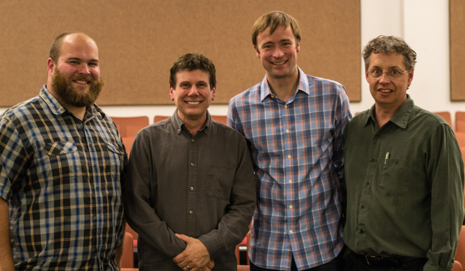 From left, Vinny Green and David Mikkelson of Snopes with Jevin West and Carl Bergstrom.