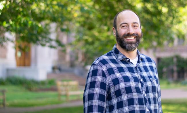 Ryan Calo, photographed outdoors in a campus setting