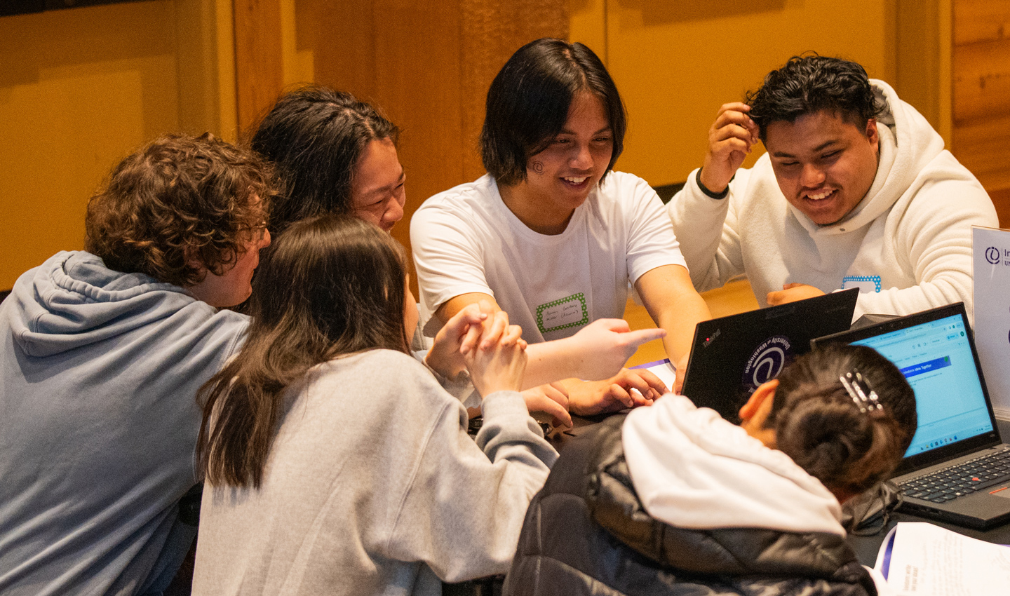 Informatics students work with high school students at the 2024 Hack for Social Good.