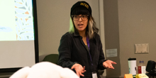 Itza Carbajal speaks before a group of children