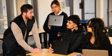 From left, Liam Sheridan of Provn speaks with Informatics student Tong Wu, Career Services Program Coordinator Kyle Raychel and MSIM student Abrevaa E. Prihutama.