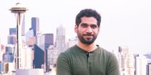 Rahul Zende, with the Seattle skyline behind him.
