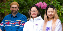 Zach Greenman, Skye Shen and Kexuan Feng seated on a bench.