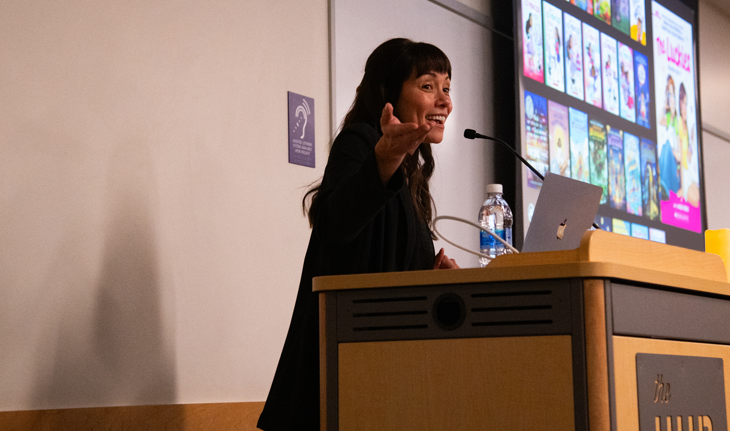 Christina Soontornvat speaks at a lectern.