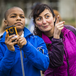 Saba Kawas collaborating with a tween to build collections of nature photos in the NatureCollections app in 2018