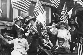 Women celebrate after winning the right to vote.