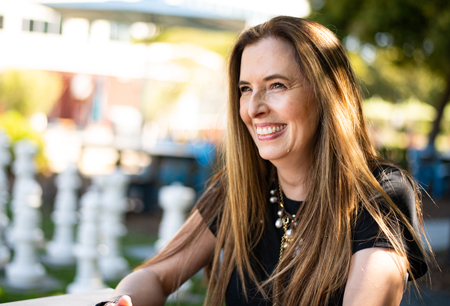 Sunny Consolvo smiles while seated