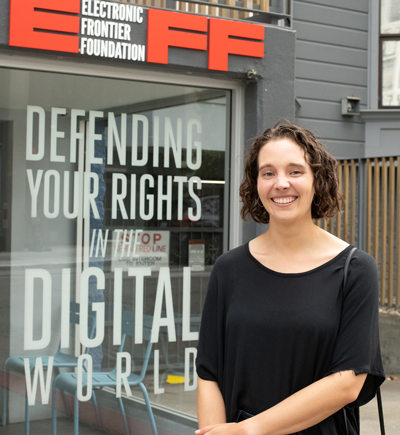 Gennie Gebhart stands outside the front door to the Electronic Frontier Foundation