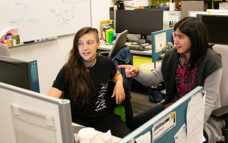 Yim Register and Mina Tari in their office