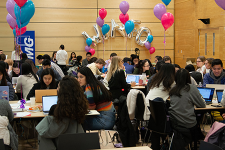 Teams of students participate in the Winfo Hackathon.