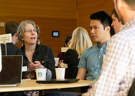 Batya Friedman speaks during a table talk