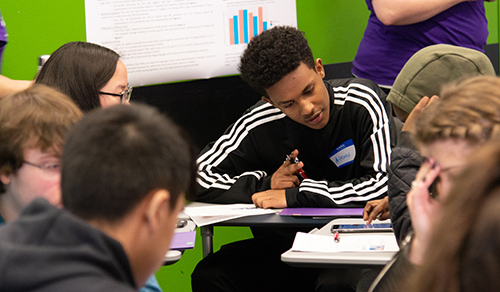 Students work on an exercise during MisinfoDay